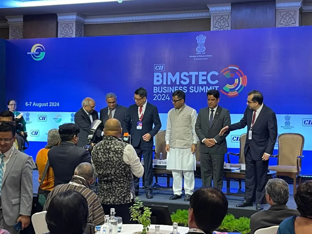 A group gathered on stage during the summit.