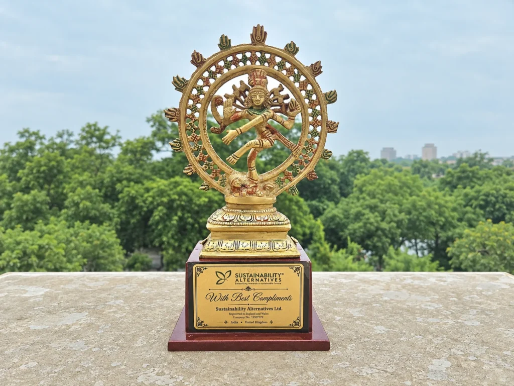 Decorative statuette on a base bearing Sustainability Alternatives branding.