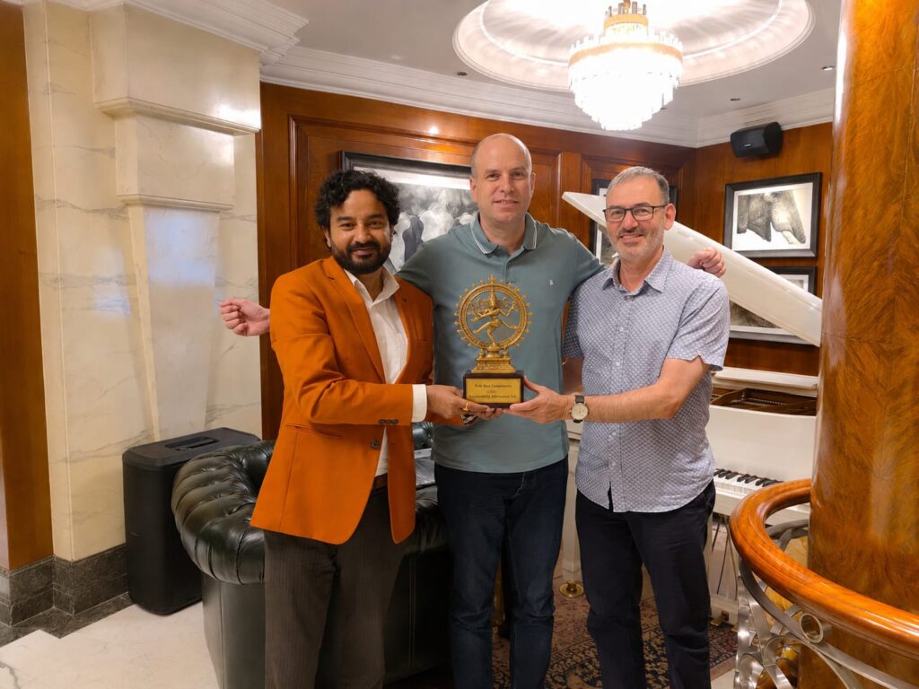 Dr. Ashish Sharma with two members of the Stardust Solutions delegation at Claridges, New Delhi